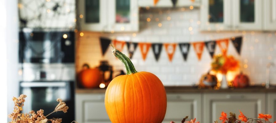 Autumn,Background,For,The,Halloween,Holiday.,Pumpkin,On,Wooden,Table